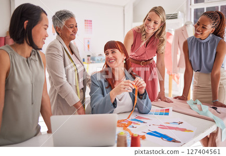 Fashion designer, women diversity and teamwork collaboration with laptop, paper design or color pattern. Smile, happy and talking creative seamstress workers in clothes manufacturing workshop studio Fashion designer, women diversity and teamwork collaboration with laptop, paper design or color pattern. Smile, happy and talking creative seamstress workers in clothes manufacturing workshop studio 127404561