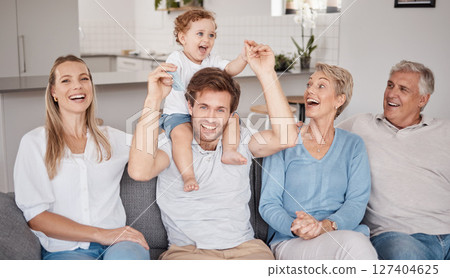 Playful, portrait and big family on the living room sofa during a visit from grandparents. Love, smile and baby bonding with his parents and senior man and woman on the couch in happiness together 127404625