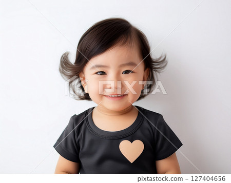 Smiling infant 127404656