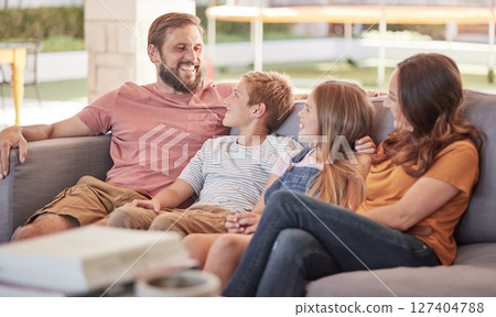 Happy family, sofa and relax together, laugh and funny joke with smile, happiness and sitting in home. Father, mother and young kids on couch with bonding, comic and love in lounge at holiday house 127404788