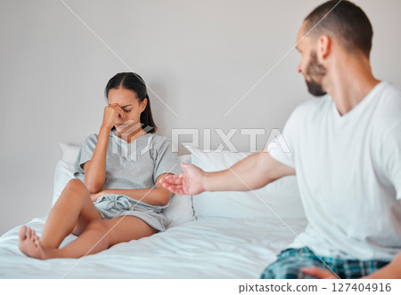 Comfort, crying and sad couple in bed after fight, argument and disagreement at home. Love, marriage and young man reaching to console upset and depressed woman sitting in bedroom to fix relationship Comfort, crying and sad couple in bed after fight, argument and disagreement at home. Love, marriage and young man reaching to console upset and depressed woman sitting in bedroom to fix relationship 127404916
