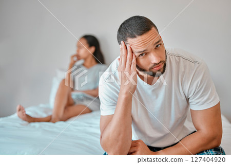 Couple, divorce and stress in home bedroom, fighting or argument. Portrait, anxiety and unhappy man and woman, sad and depressed after infidelity, toxic relationship or failed marriage in house. Couple, divorce and stress in home bedroom, fighting or argument. Portrait, anxiety and unhappy man and woman, sad and depressed after infidelity, toxic relationship or failed marriage in house. 127404920