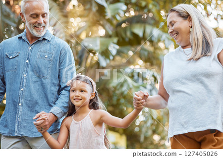 Park, holding hands and grandparents with child for outdoor walking, nature wellness and development in summer, holiday and travel. Happy girl with senior family in garden bonding together with love Park, holding hands and grandparents with child for outdoor walking, nature wellness and development in summer, holiday and travel. Happy girl with senior family in garden bonding together with love 127405026