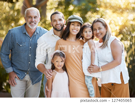 Big family, portrait and happy smile, love and support together outdoor in nature parking with care, trust and bond. Girl kids, mother and father bonding with grandparents with happiness in Amsterdam Big family, portrait and happy smile, love and support together outdoor in nature parking with care, trust and bond. Girl kids, mother and father bonding with grandparents with happiness in Amsterdam 127405065