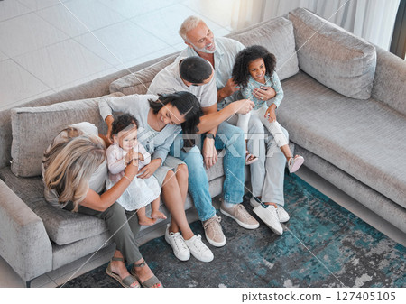 Happy family, children or parents bonding with senior grandparents on sofa in house or home living room. Top view, men or women with kids, girls and retirement elderly people together on lounge couch Happy family, children or parents bonding with senior grandparents on sofa in house or home living room. Top view, men or women with kids, girls and retirement elderly people together on lounge couch 127405105