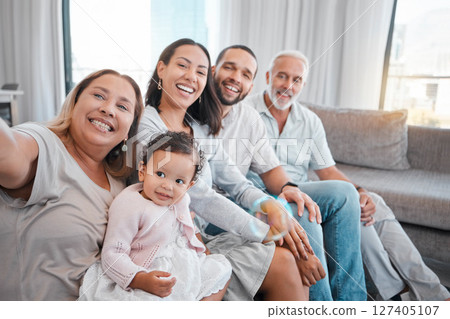 Big family, selfie and happy baby, parents and grandparents together on living room couch for bonding, love and care. Portrait of men, women and child together in their Puerto Rico house with a smile Big family, selfie and happy baby, parents and grandparents together on living room couch for bonding, love and care. Portrait of men, women and child together in their Puerto Rico house with a smile 127405107