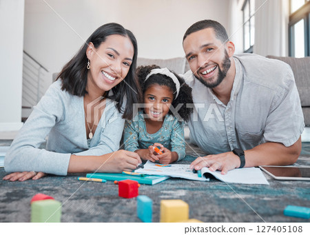 Family, portrait and bonding for education, learning and drawing or playing with toys on the living room floor. Mother, father and little girl learn with homework, school work and writing Family, portrait and bonding for education, learning and drawing or playing with toys on the living room floor. Mother, father and little girl learn with homework, school work and writing 127405108