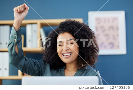 Celebration, success and black woman giving support to online trading, fintech and happy about promotion on a laptop. Goal, motivation and worker with smile for pc email, achievement and bonus 127405396