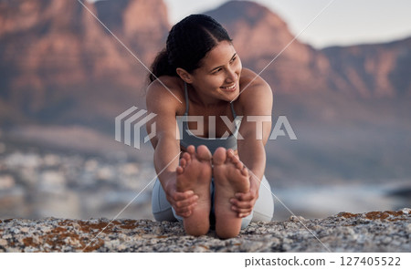 Fitness, yoga and stretching with a woman on the beach for wellness, mental health or exercise in nature. Environment, peace and thinking with a female athlete doing a warm up for zen training 127405522