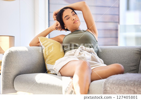 Tired black woman, relax and sleeping on sofa for recovery, weekend or holiday break from work at home. Exhausted female taking a nap, relaxing or resting on the living room couch in fatigue indoors Tired black woman, relax and sleeping on sofa for recovery, weekend or holiday break from work at home. Exhausted female taking a nap, relaxing or resting on the living room couch in fatigue indoors 127405801