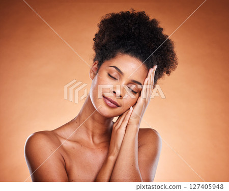 Peace, wellness and model for skincare beauty touching face for natural and healthy cosmetic marketing. Black woman, facial and body care health cosmetics advertising on orange studio mockup. 127405948