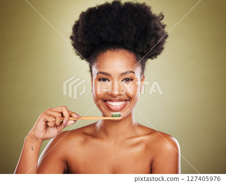 Dental, wood toothbrush or black woman with smile for teeth wellness, cleaning or eco friendly in studio background. Girl, happy portrait with bamboo brush, healthcare or teeth whitening product Dental, wood toothbrush or black woman with smile for teeth wellness, cleaning or eco friendly in studio background. Girl, happy portrait with bamboo brush, healthcare or teeth whitening product 127405976