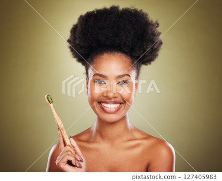 Wooden toothbrush, black woman and portrait for eco friendly self care, beauty or cosmetics with smile. Model, woman and african for dental, healthcare or organic teeth whitening by studio background 127405983