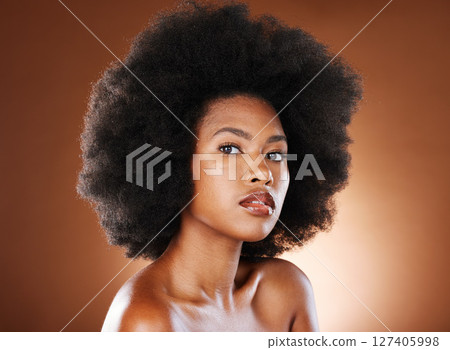 Beauty, black woman with natural hair and skincare portrait, cosmetic advertising and wellness with studio background. Natural cosmetics, healthy skin and glow, makeup with hair care and afro mockup. Beauty, black woman with natural hair and skincare portrait, cosmetic advertising and wellness with studio background. Natural cosmetics, healthy skin and glow, makeup with hair care and afro mockup. 127405998
