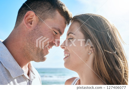 Couple, love and happy smile at beach, holiday and anniversary travel in summer with romance in Ibiza. Young man and woman enjoy marriage, happiness and content together outdoor at a ocean vacation Couple, love and happy smile at beach, holiday and anniversary travel in summer with romance in Ibiza. Young man and woman enjoy marriage, happiness and content together outdoor at a ocean vacation 127406077