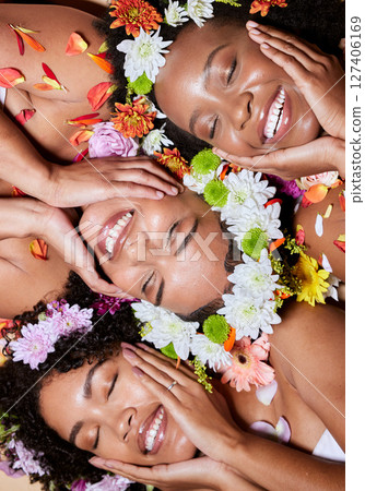 Black woman, flowers and face skincare beauty for cosmetics makeup or natural skin wellness. African friends, floral crown and nature product for luxury plant aesthetic or relax, zen and facial care Black woman, flowers and face skincare beauty for cosmetics makeup or natural skin wellness. African friends, floral crown and nature product for luxury plant aesthetic or relax, zen and facial care 127406169