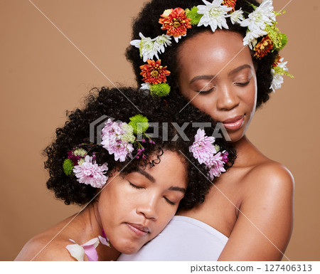 Beauty, flowers and black women with diversity calm from skincare, skin health glow and cosmetics. Model together with flower and plant based facial, cosmetic and healthy floral wellness 127406313