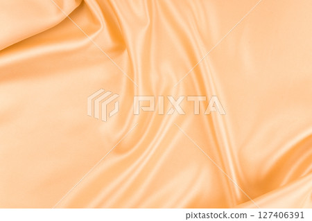 Smooth elegant orange silk can use as background. Smooth elegant orange silk can use as background. 127406391