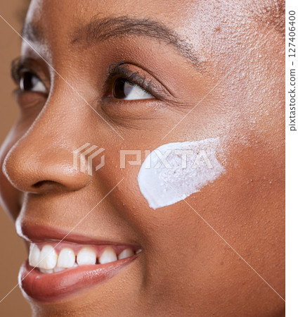 Skincare, face cream and black woman happy about health, natural wellness and dermatology. Beauty, healthy skin glow and cosmetics of woman model smile from facial lotion and anti aging moisturizer 127406400