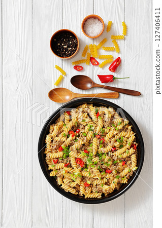 creamy ground beef cheeseburger pasta, top view creamy ground beef cheeseburger pasta, top view 127406411