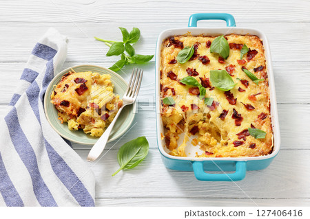 twice baked potato casserole in a baking dish 127406416