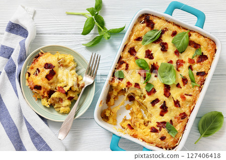 twice baked potato casserole in a baking dish twice baked potato casserole in a baking dish 127406418