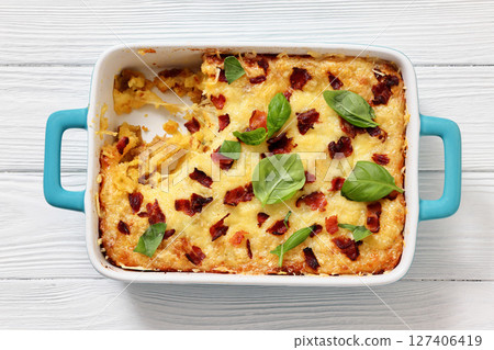 twice baked potato casserole in a baking dish twice baked potato casserole in a baking dish 127406419