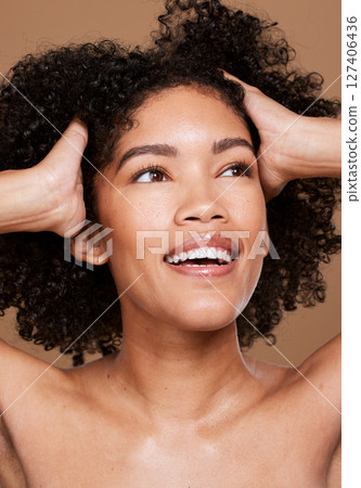 Black woman, beauty and face skincare, wellness and hair care with makeup, glow or cosmetics on brown studio background. Happy female model, facials cosmetic and happy smile for healthy or clean skin Black woman, beauty and face skincare, wellness and hair care with makeup, glow or cosmetics on brown studio background. Happy female model, facials cosmetic and happy smile for healthy or clean skin 127406436