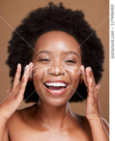 Beauty, skincare and portrait of a black woman in studio with an organic, cosmetic and healthy face routine. Health, wellness and African model ding natural facial skin treatment by brown background. Beauty, skincare and portrait of a black woman in studio with an organic, cosmetic and healthy face routine. Health, wellness and African model ding natural facial skin treatment by brown background. 127406469