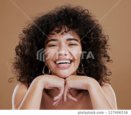 Beauty, skincare and black woman in studio with natural hair and happy about cosmetics, makeup and dermatology product on brown background. Happiness, dermatology and self love of an African model Beauty, skincare and black woman in studio with natural hair and happy about cosmetics, makeup and dermatology product on brown background. Happiness, dermatology and self love of an African model 127406536