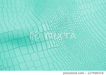 Turquoise color artificial crocodile leather texture background. 127406558