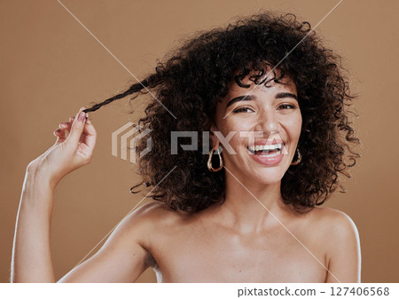 Hair care, growth and woman excited about health, wellness and clean shampoo against a brown studio background. Salon, smile and portrait of a model with hair beauty and shine from hairdresser Hair care, growth and woman excited about health, wellness and clean shampoo against a brown studio background. Salon, smile and portrait of a model with hair beauty and shine from hairdresser 127406568