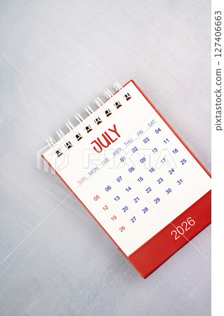 July 2026 on gray color wooden table, Flat lay. July 2026 on gray color wooden table, Flat lay. 127406663