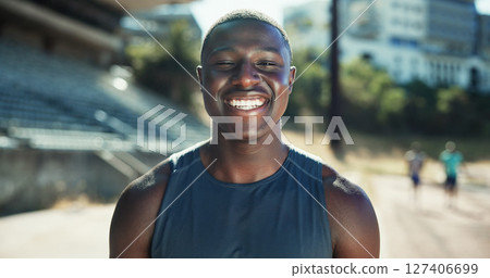 Portrait, athlete and black man with smile at stadium for exercise, sports training and practice on field. Male runner, happy and confidence for fitness, workout and endurance for marathon challenge Portrait, athlete and black man with smile at stadium for exercise, sports training and practice on field. Male runner, happy and confidence for fitness, workout and endurance for marathon challenge 127406699