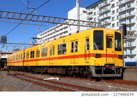 Tobu 8000 series yellow train on the Isesaki Line (return train: Tobu Kameido Line to Tobu Daishi Line) Tobu 8000 series yellow train on the Isesaki Line (return train: Tobu Kameido Line to Tobu Daishi Line) 127406834