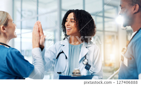 Doctor, woman and team with high five, smile and clipboard for results, breakthrough and celebration. People, medical staff and goals with support, cheers and motivation with checklist at hospital 127406888