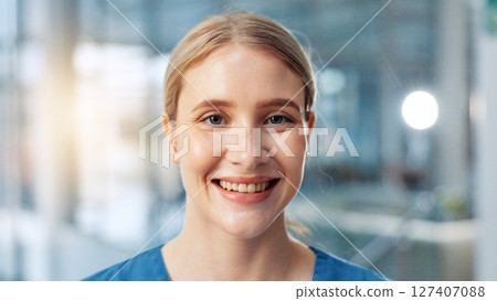 Smile, healthcare and portrait of woman nurse in hospital for about us, service and confidence. Happy face, medical and scrubs with friendly medicine professional in clinic for medicare or therapy 127407088
