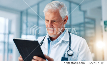 Healthcare, doctor or man in clinic, tablet or typing with email for research funding. Digital app, mature person or medical with professional, tech or online reading for diagnosis report or internet Healthcare, doctor or man in clinic, tablet or typing with email for research funding. Digital app, mature person or medical with professional, tech or online reading for diagnosis report or internet 127407105