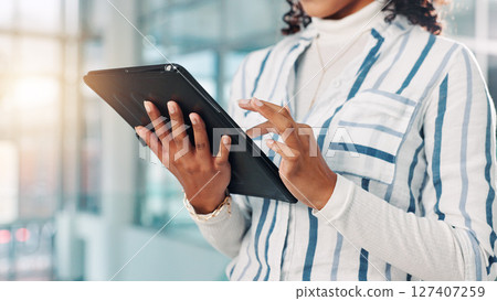 Hands, woman and typing on tablet in office for research, financial report and schedule update. Accountant, reading and digital for finance agenda, information and budget review for investment email Hands, woman and typing on tablet in office for research, financial report and schedule update. Accountant, reading and digital for finance agenda, information and budget review for investment email 127407259