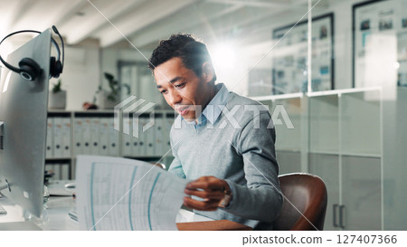 Computer, document and man with admin in call center for help or online assistance. Consultant, paperwork and customer service with employee in office for feedback or support as virtual assistant 127407366