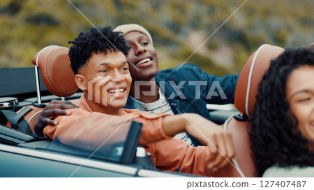 Drive, road trip and thinking with happy friends in car together for holiday, travel or vacation. Freedom, smile and vision with group of people riding in convertible vehicle for weekend getaway Drive, road trip and thinking with happy friends in car together for holiday, travel or vacation. Freedom, smile and vision with group of people riding in convertible vehicle for weekend getaway 127407487
