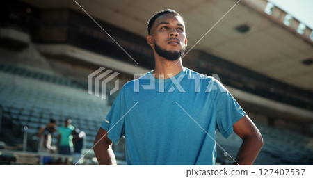 Fitness, runner and man with thinking at stadium for competition practice, contemplating workout and training. Athlete, person and ready for running track outdoor with exercise reflection or marathon Fitness, runner and man with thinking at stadium for competition practice, contemplating workout and training. Athlete, person and ready for running track outdoor with exercise reflection or marathon 127407537
