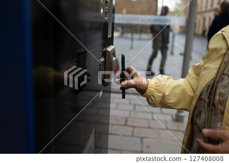 Paying for Public Transport Ticket in Krakow 127408008
