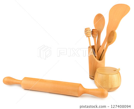 Set of wooden kitchen utensils isolated on white. Free space for text. 127408094