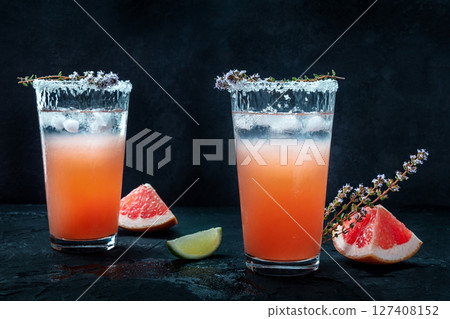 Salty Dog cocktail with fresh grapefruit juice, lime juice, and thyme 127408152