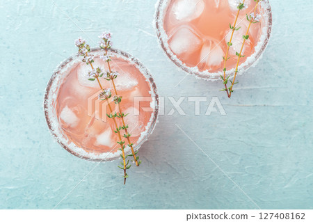 Salty Dog cocktail with fresh grapefruit juice, lime juice, and thyme Salty Dog cocktail with fresh grapefruit juice, lime juice, and thyme 127408162