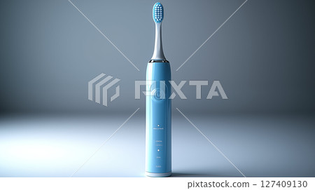 Modern electric toothbrush with blue handle and white bristles 127409130