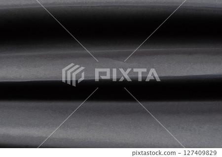 One Hundred Percent Nylon Grey Fabric Macro Texture. One Hundred Percent Nylon Grey Fabric Macro Texture. 127409829