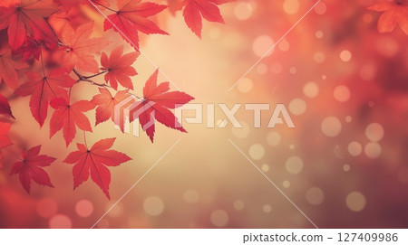 Vibrant red maple leaves on soft blurred background creating warm autumn atmosphere Card Copy space 127409986