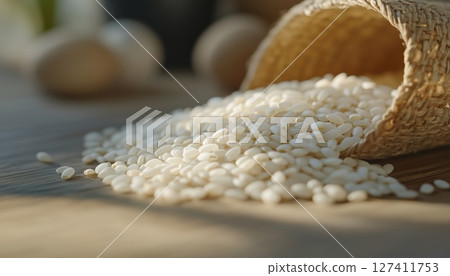 Selective Focus On White Rice Placed On A Wooden Table 127411753